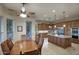 Well-equipped kitchen featuring granite island, stainless steel appliances, and breakfast bar at 23861 N 74Th Pl, Scottsdale, AZ 85255