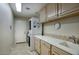 Laundry room with stackable washer and dryer at 23861 N 74Th Pl, Scottsdale, AZ 85255