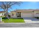 Single-story home with attached garage and front yard at 23901 S Vacation Way, Sun Lakes, AZ 85248