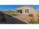 Artificial turf backyard with patio and block wall at 2455 E Alida Trl, Casa Grande, AZ 85194