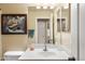 Bathroom with single vanity and mirrored medicine cabinet at 2509 W Straight Arrow Ln, Phoenix, AZ 85085