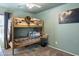 Bedroom with twin-over-twin bunk bed and playful decor at 2509 W Straight Arrow Ln, Phoenix, AZ 85085