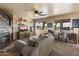 Living room with fireplace, large windows, and rustic decor at 2509 W Straight Arrow Ln, Phoenix, AZ 85085