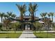 Community pool entrance with palm trees and modern architecture at 26111 N 23Rd Ave, Phoenix, AZ 85085