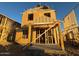 Two-story house under construction, showing framing and exterior features at 26111 N 23Rd Ave, Phoenix, AZ 85085