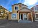 Two-story house under construction, featuring a covered porch and modern design at 26111 N 23Rd Ave, Phoenix, AZ 85085