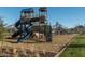 Modern playground with slides and climbing structures at 26111 N 23Rd Ave, Phoenix, AZ 85085