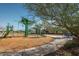 Modern playground equipment, shaded areas and wood-chip ground cover at 26111 N 23Rd Ave, Phoenix, AZ 85085