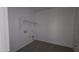 Laundry room showing hookups and shelving in a room with wood-look floors at 2657 E Abe Truckle Ave, San Tan Valley, AZ 85140