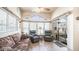 Sunlit living room with comfy seating and large window at 288 Diamond Dr, Apache Junction, AZ 85119