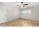 Bright bedroom featuring tile floors and a ceiling fan at 2905 W Stella Ln, Phoenix, AZ 85017