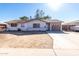 Ranch-style home with a large yard and a two-car garage at 2905 W Stella Ln, Phoenix, AZ 85017