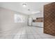 Bright kitchen with white cabinets and tile backsplash at 2905 W Stella Ln, Phoenix, AZ 85017