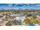 Aerial view showing a house with a large yard and distant mountain backdrop at 29619 N 60Th St, Cave Creek, AZ 85331