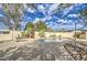 Inviting backyard oasis featuring a sparkling pool, spa, and desert landscaping at 29619 N 60Th St, Cave Creek, AZ 85331