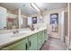 Bathroom with double vanity and a large mirror at 29619 N 60Th St, Cave Creek, AZ 85331