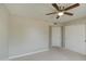 Bedroom with double closets and ceiling fan at 29619 N 60Th St, Cave Creek, AZ 85331