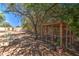 Charming chicken coop nestled amongst lush greenery in the backyard at 29619 N 60Th St, Cave Creek, AZ 85331