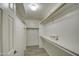 Large walk-in closet with double hanging rods at 29619 N 60Th St, Cave Creek, AZ 85331