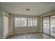 Dining area with backyard access and wood-look floors at 29619 N 60Th St, Cave Creek, AZ 85331