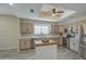 Kitchen features stainless steel appliances and an island with butcher block top at 29619 N 60Th St, Cave Creek, AZ 85331