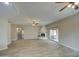 Bright living room featuring tile floors, fireplace, and access to backyard at 29619 N 60Th St, Cave Creek, AZ 85331