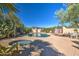 Refreshing pool and spa surrounded by a large patio and lush desert landscape at 29619 N 60Th St, Cave Creek, AZ 85331