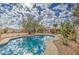 Relaxing kidney-shaped pool with stunning views and beautiful desert landscaping at 29619 N 60Th St, Cave Creek, AZ 85331