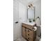 Updated bathroom with light wood vanity and patterned tile floor at 3077 W Ironwood Cir, Chandler, AZ 85226