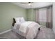 Light and airy guest bedroom with neutral decor at 3077 W Ironwood Cir, Chandler, AZ 85226