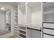 Large walk-in closet with ample shelving and drawers at 3077 W Ironwood Cir, Chandler, AZ 85226