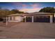 Stunning two-car garage home with a tile roof and landscaping at 3077 W Ironwood Cir, Chandler, AZ 85226