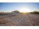 Large backyard with gravel and sparse vegetation at 34214 W Sahuaro St, Tonopah, AZ 85354