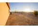 Gravel backyard with a portion of house visible at 34214 W Sahuaro St, Tonopah, AZ 85354