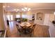 Open dining area with table and chairs, adjacent to living room at 34214 W Sahuaro St, Tonopah, AZ 85354