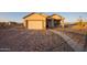 One story house with attached garage and covered porch at 34214 W Sahuaro St, Tonopah, AZ 85354