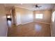 Spacious living room with tile floors and access to hallway at 34214 W Sahuaro St, Tonopah, AZ 85354