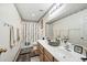 Bathroom with double sinks and a shower/tub combo at 3448 W Sunshine Butte Dr, San Tan Valley, AZ 85144