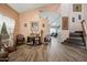 Bright and airy living room with hardwood floors and plenty of natural light at 3448 W Sunshine Butte Dr, San Tan Valley, AZ 85144