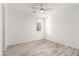 Spacious bedroom with ceiling fan and large closet at 35350 W Marin Ave, Maricopa, AZ 85138