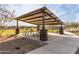 Covered picnic area with tables and benches at 35350 W Marin Ave, Maricopa, AZ 85138