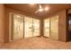 Covered patio with glass doors leading to the kitchen at 35350 W Marin Ave, Maricopa, AZ 85138