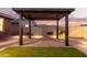 Covered pergola in the backyard, perfect for outdoor entertaining at 35350 W Marin Ave, Maricopa, AZ 85138