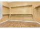 Spacious closet with hanging rods and shelves at 3677 N Hudson Dr, Florence, AZ 85132