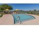 Smaller, more intimate pool area with lounge chairs and umbrellas at 3677 N Hudson Dr, Florence, AZ 85132