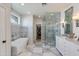 Luxurious bathroom with marble flooring and walk-in shower at 3838 E Devonshire Ave, Phoenix, AZ 85018