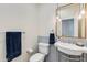 Small bathroom with pedestal sink and gray tile at 3838 E Devonshire Ave, Phoenix, AZ 85018