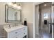 Stylish bathroom with gray tile and white vanity at 3838 E Devonshire Ave, Phoenix, AZ 85018