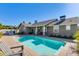 Inviting backyard with refreshing blue pool and patio at 3838 E Devonshire Ave, Phoenix, AZ 85018