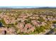 Aerial view showing a luxury community with Spanish-style architecture at 3935 E Rough Rider Rd # 1235, Phoenix, AZ 85050